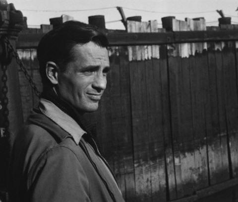 Jack Kerouac waits for a ferry at a dock in Staten Island 1965