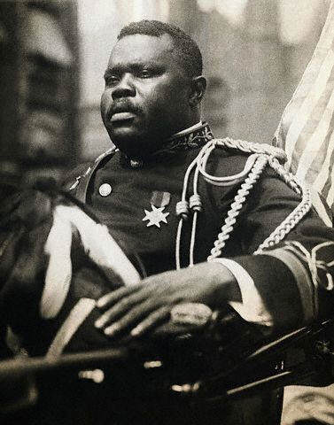 Marcus Garvey, riding in the giant parade through Harlem